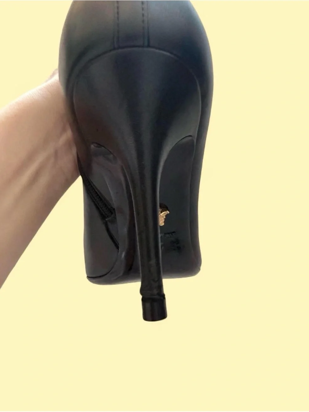 Versace Black Leather Pointed-Toe Stiletto Ankle Boot with Gold Medusa Accent